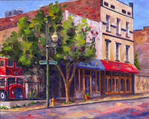 View along Biltmore Avenue in Downtown Asheville with the double decker Coffee Bus