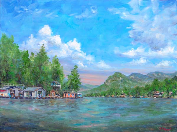 View across Lake Lure NC and up the Hickory Nut Gorge with Boat houses along the lake.