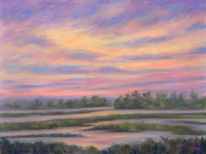 Sunset marsh view across the tidal creeks of Charleston's Low Country.