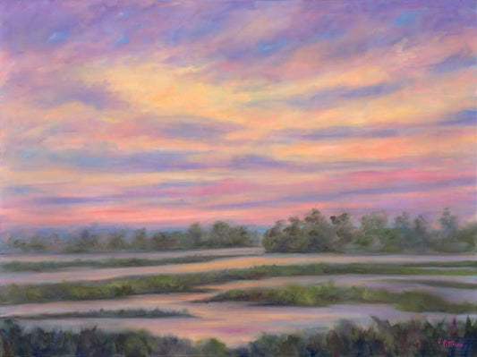 Sunset marsh view across the tidal creeks of Charleston's Low Country.
