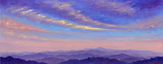 Colorful sweeping cloud formation over Mt Pisgah near Asheville, NC.  View looking West